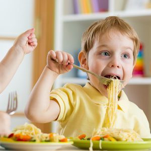 35418213 - kids eating food in nursery or at home